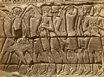 Philistine captives Ramses3 BCE1177 feathered headdress wall relief Medinet Habu Thebes
